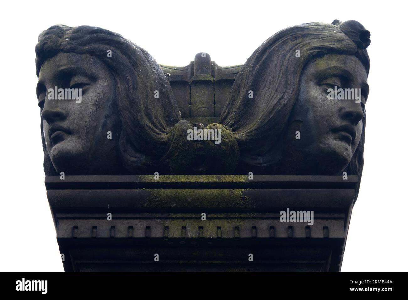 Two female heads looking in opposite directions, funerary art on a grave in Glasgow Necropolis, Glasgow Scotland UK Stock Photo