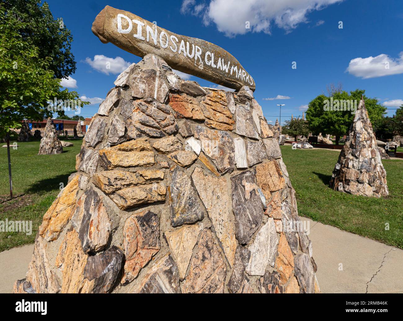 A pile of rocks with a sign reading "DINOSUAR CLAW MARKS" at Lemmon