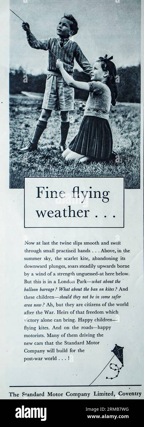 A 1942 wartime advertisement for The Standard Motor Company Limited, Coventy. The advertisement shows an illustration of two children, in a London park, flying a kite. During World War 11, kite flying was banned, balloon barrages were a common sight in London. The advertisement however looks forward to a post war period, victory secured, children playing normally  and ‘happy motorists, many of them driving new cars  that the Standard Motor Company will build for the post war period’, Stock Photo