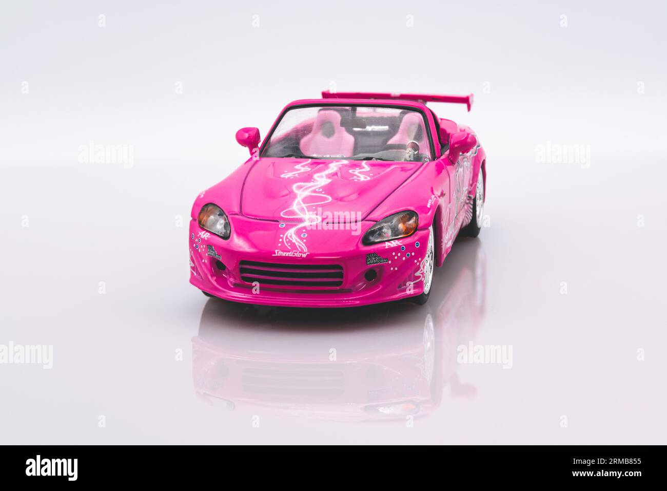 Fast&Furious Honda S2000 1:43 model car, front view, white background with reflection Stock Photo