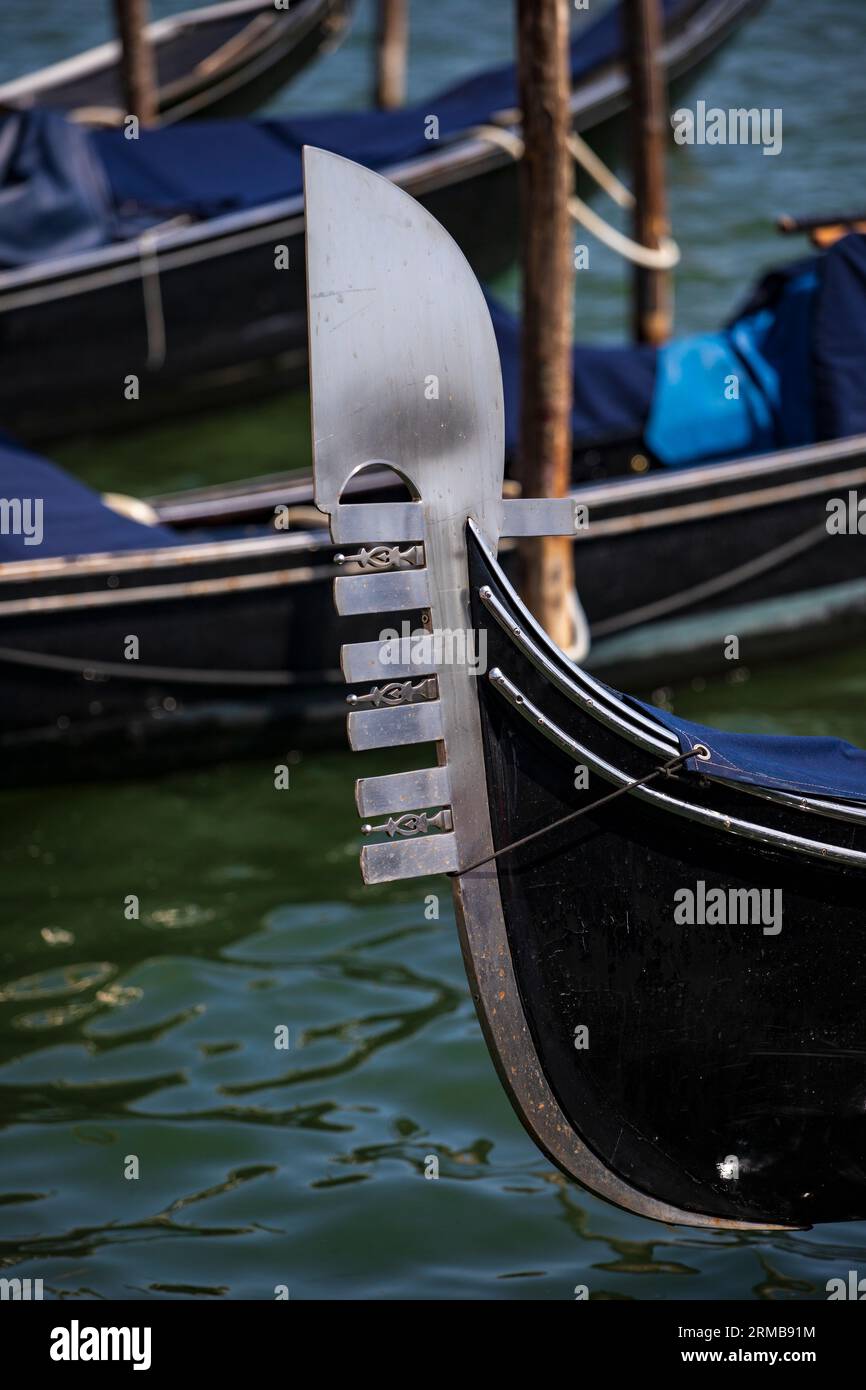 A Gondola with their Ferro in Venice Italy, August 2023 Stock Photo - Alamy