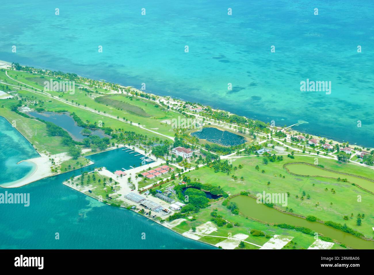 A view from the sky of Caye Chapel, a private island owned by the Four