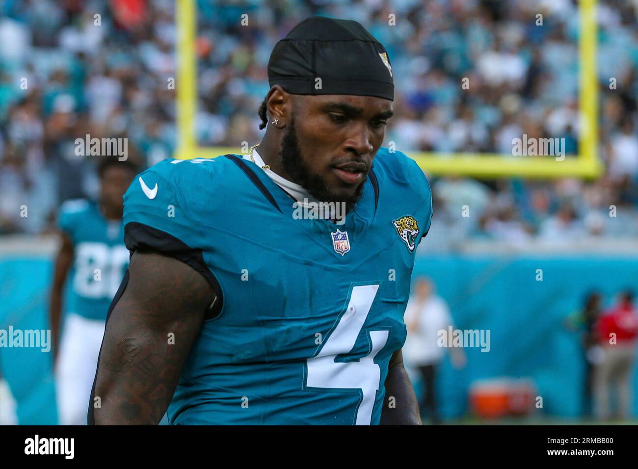 Jacksonville Jaguars running back Tank Bigsby (4) enters the field for an  NFL pre-season football game against the Miami Dolphins, Saturday, Aug. 26,  2023, in Jacksonville, Fla. The Jaguars defeated the Dolphins
