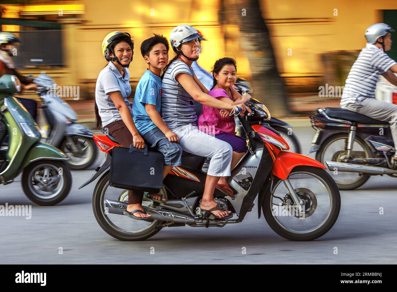 VIETNAM. HA NOI. A FAMILY ON A SCOOTER Stock Photo