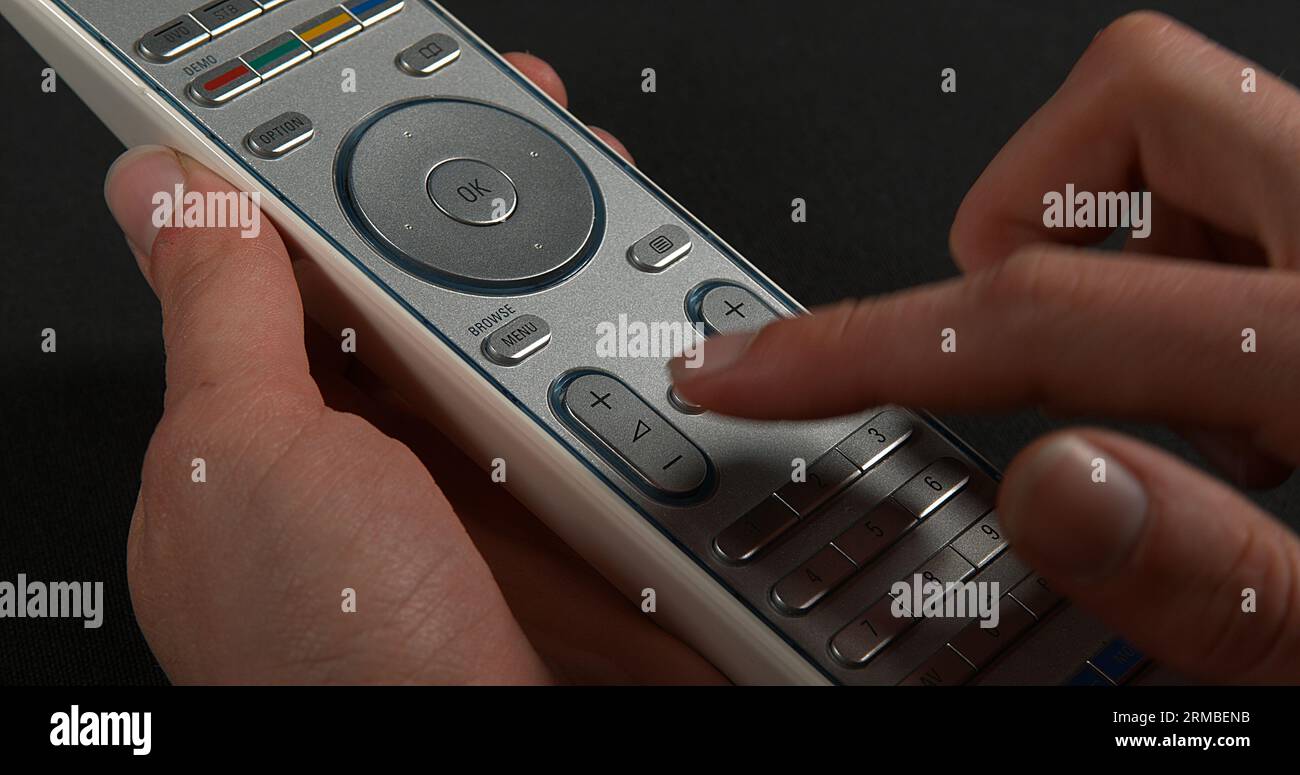 Hand Using Remote Control Hands woman remote control hi-res stock photography and images - Alamy