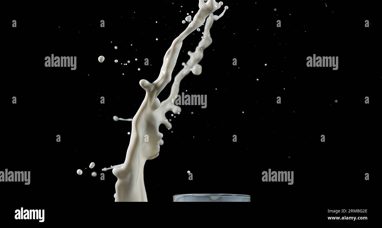 Exploding milk against black hi-res stock photography and images - Alamy