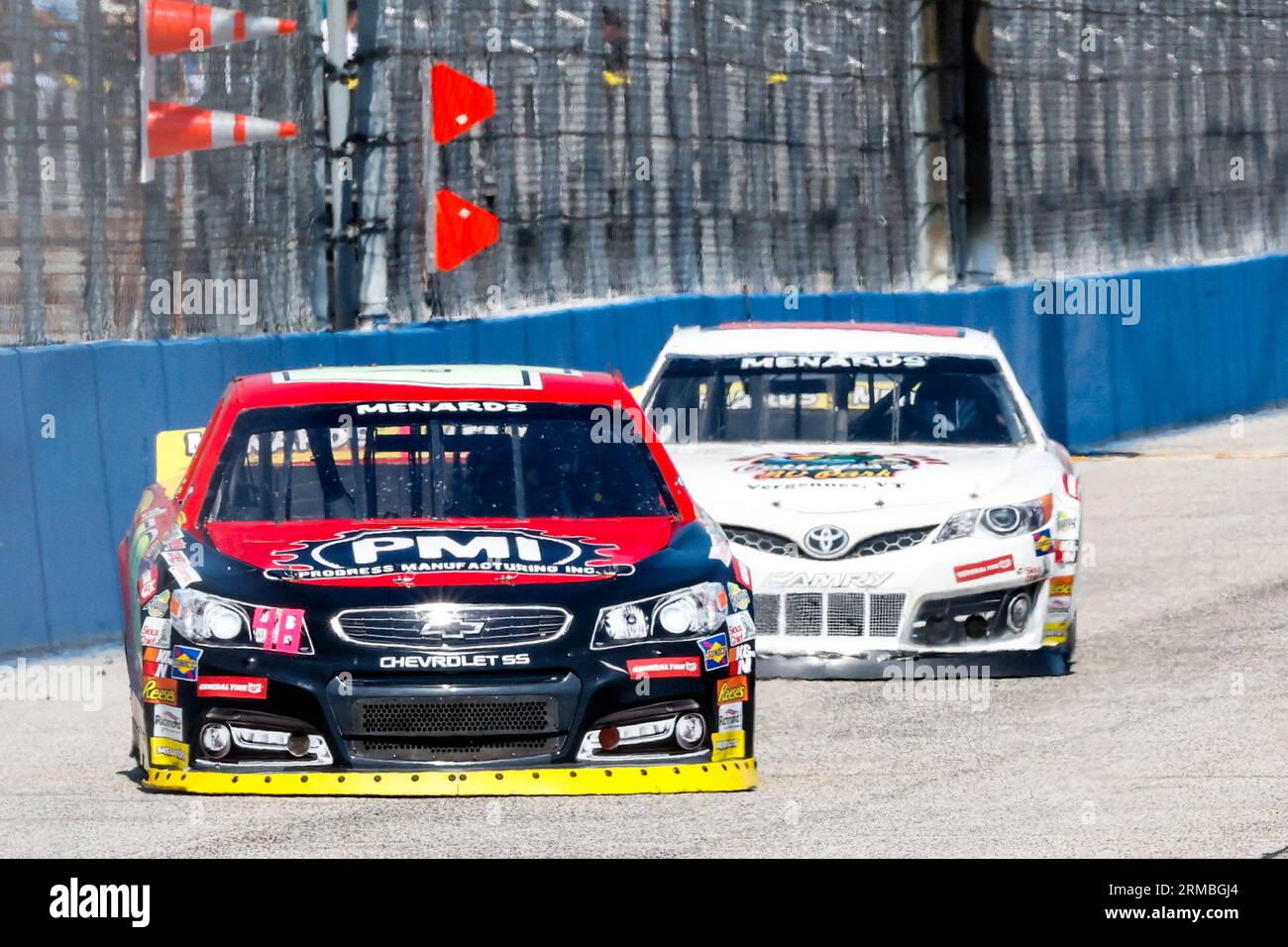 WEST ALLIS, WI - AUGUST 27: Rick Redig Tackman (48) driving the ...