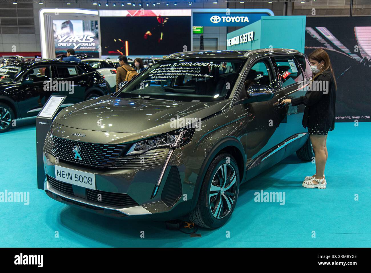 Bangkok, Thailand. 27th Aug, 2023. Visitor inspects a Peugeot New 5008 car during the Thailand Big Motor Sale 2023 at Bangkok International Trade and Exhibition Center (?BITEC). Credit: SOPA Images Limited/Alamy Live News Stock Photo