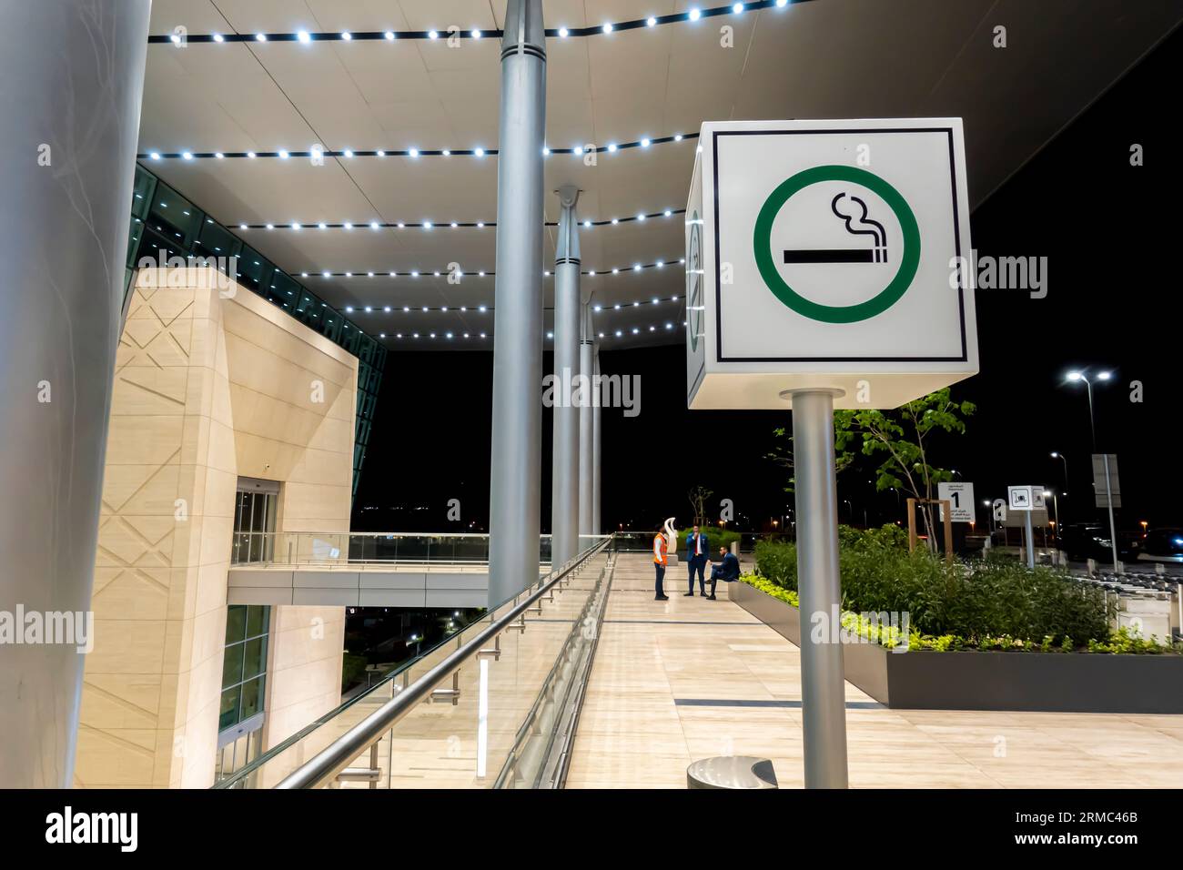 Smoking area sign outside Bahrain airport building Stock Photo Alamy