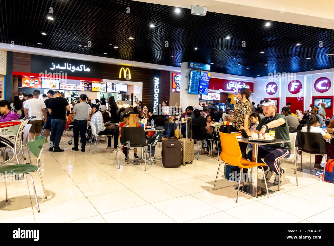 McDonalds Dubai airport cafe. KFC restaurant dubai airport. Food court airport Dubai Stock Photo