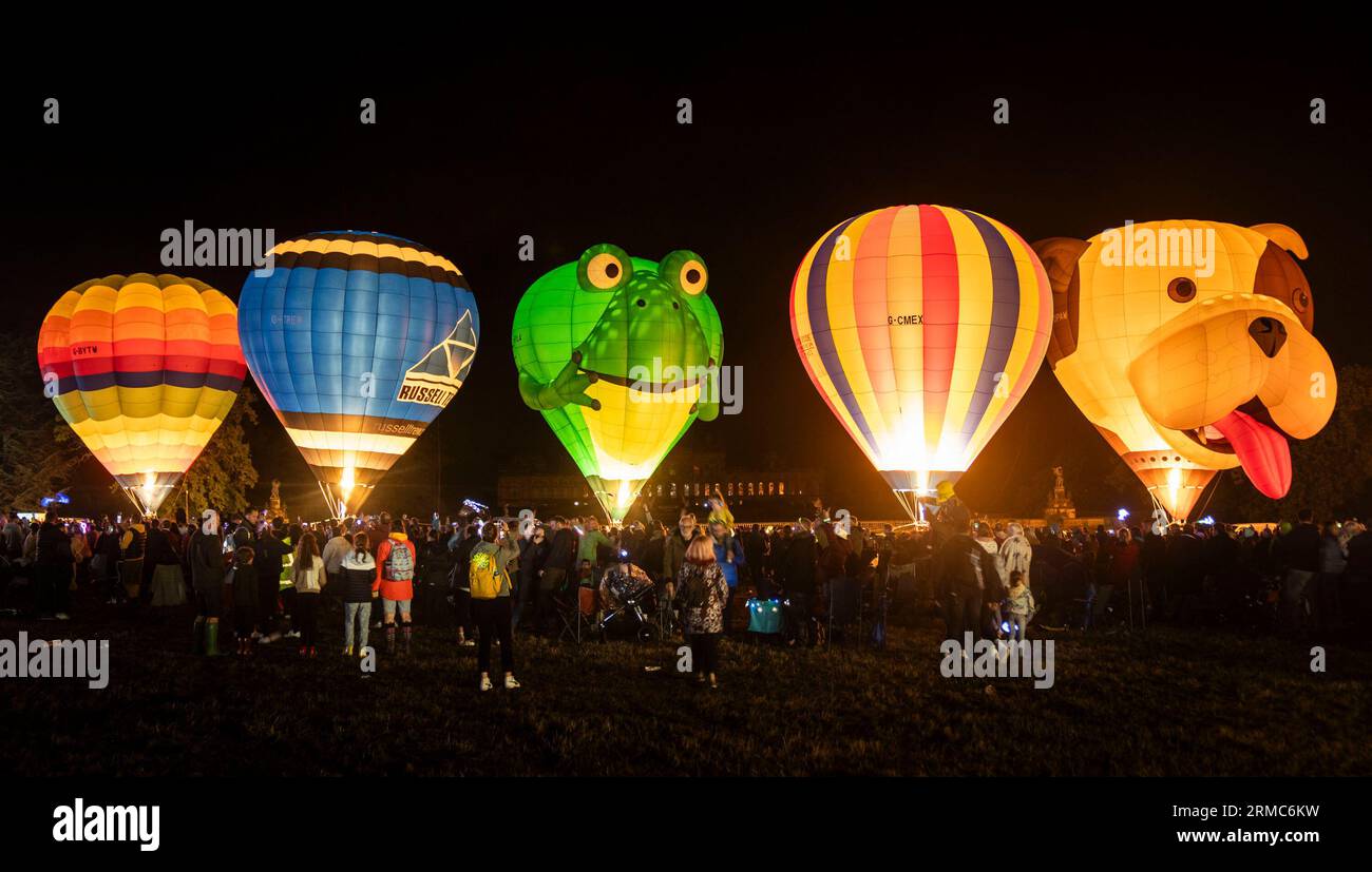 Balloons are illuminated during the Balloon Night Glow event, part of ...