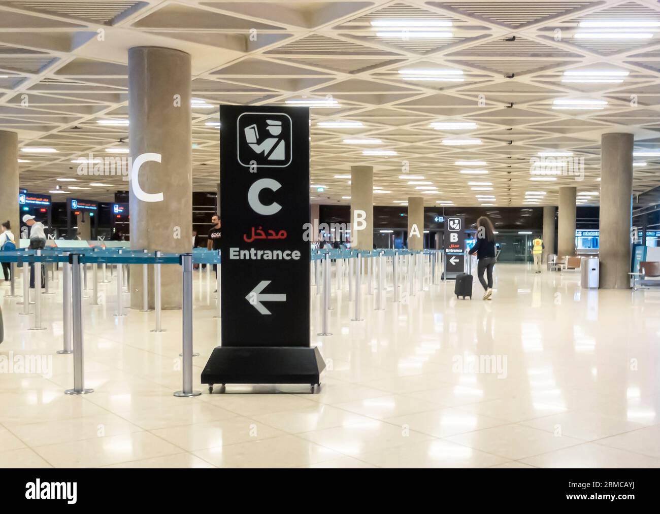 Amman airport Jordan Direction bilingual signs showing Entrance