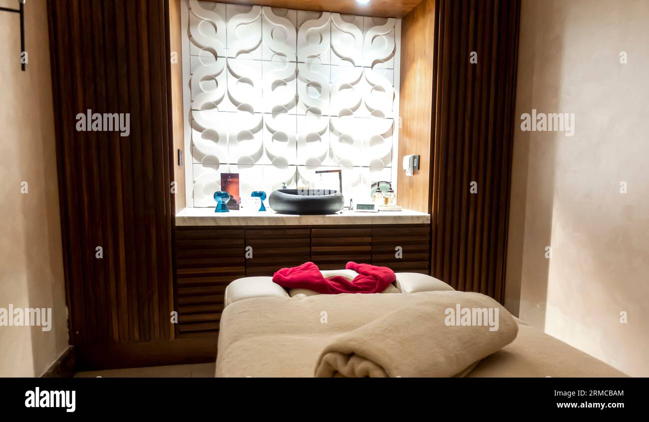 Massage room interior. Massage bed,  massage accessories desk, Amman Jordan Sheraton hotel Spa Stock Photo