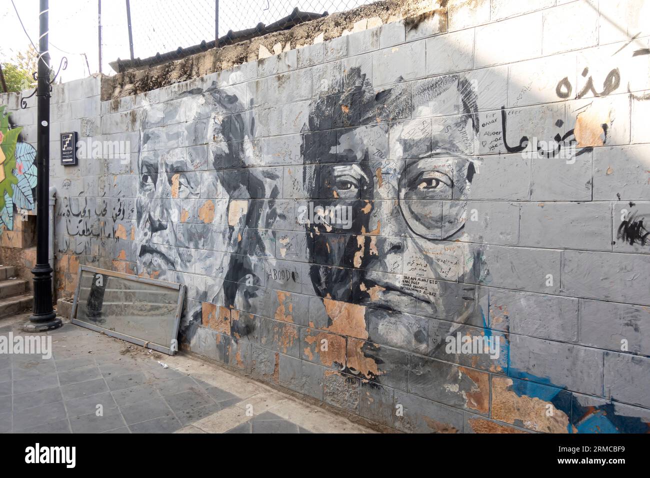 Portraits by Miramar Mohammad (Miramar Al Nayyar) 2016.  Marcel Khalife, a Lebanese singer (left) and Mahmoud Darwish, a Palestinian author. Amman Stock Photo