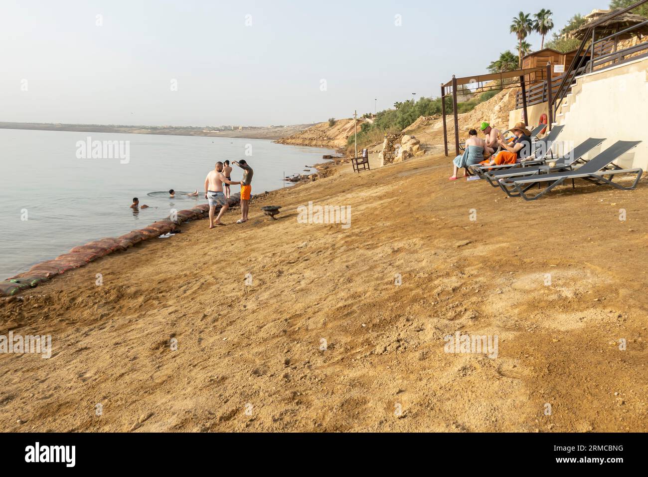 Chaize longues, relaxation area at Dead Sea Jordan resort Stock Photo