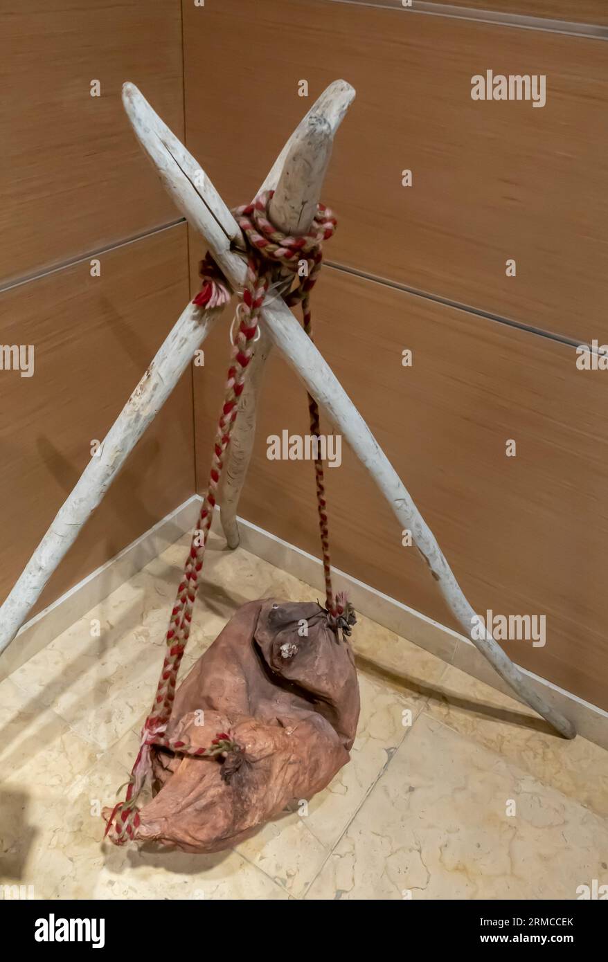 Jordanian Rekabah, three-legged crane to hang things,  and sean the skin of the goat used to agitate milk and extract the butter Stock Photo