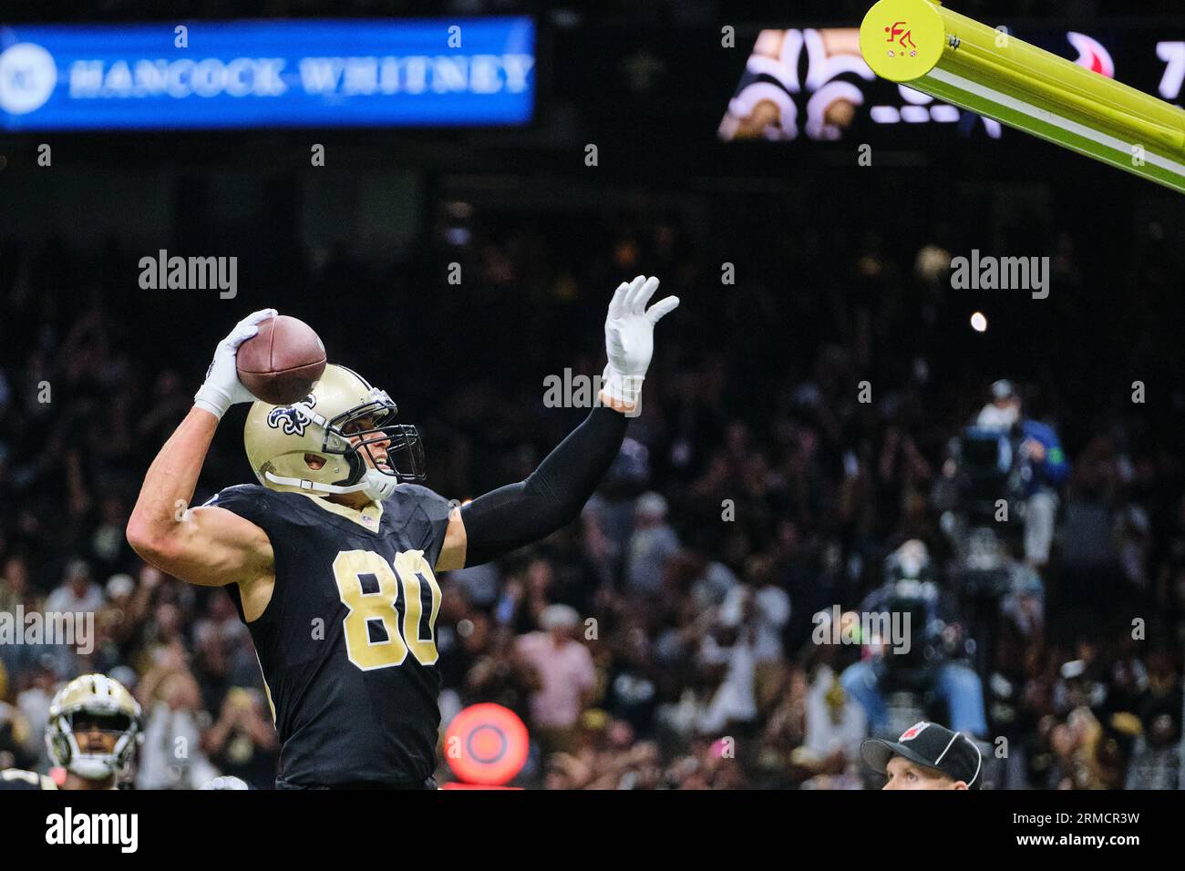 New Orleans, USA. 27th Aug, 2023. Houston Texans quarterback C.J. Stroud  (7) attempts a pass while facing a heavy pass rush from New Orleans Saints  defensive ends Tanoh Kpassagnon (92) and Carl