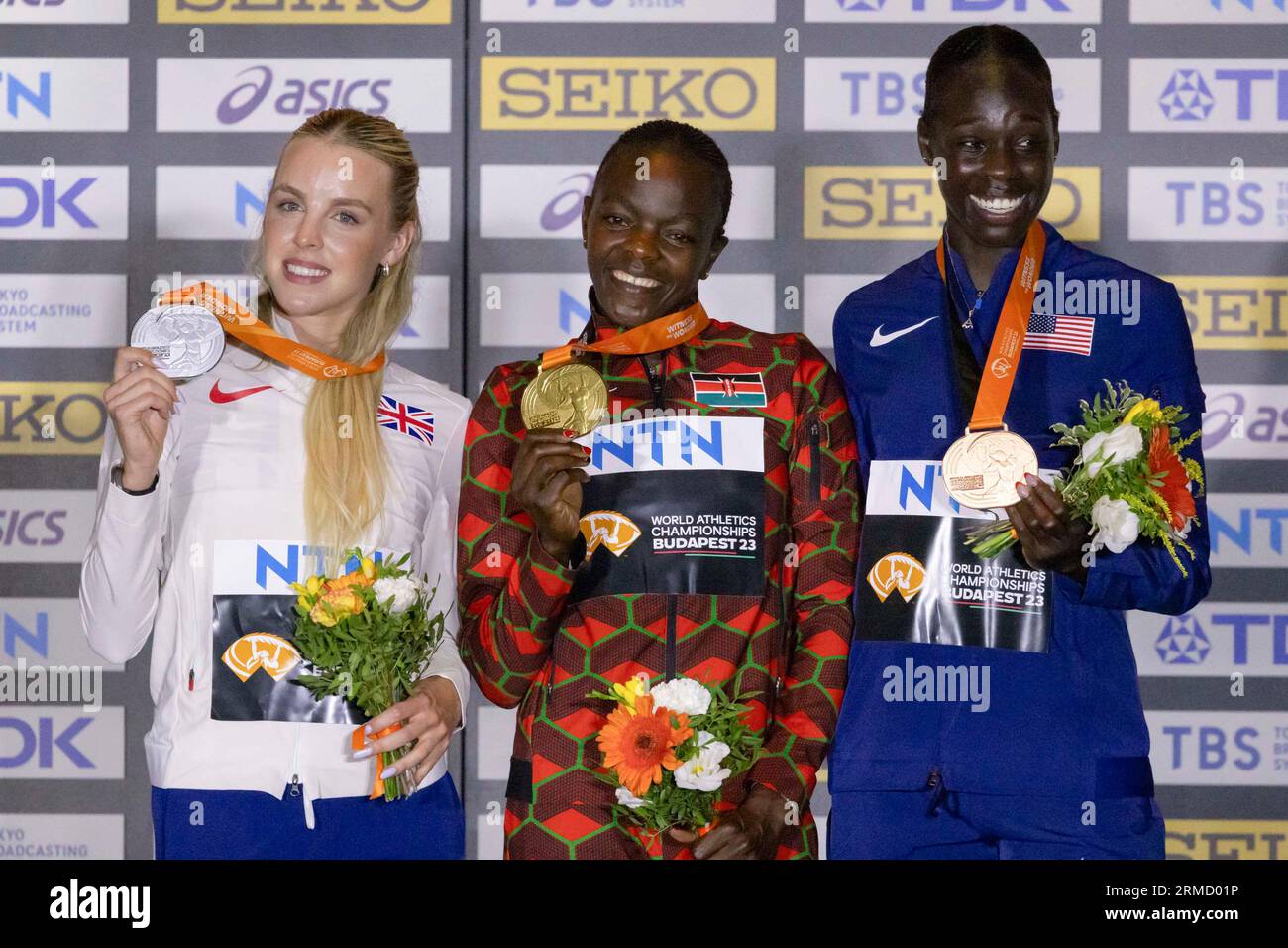 Budapest, Mary Moraa (C) of Kenya and bronze medalist Athing Mu of the