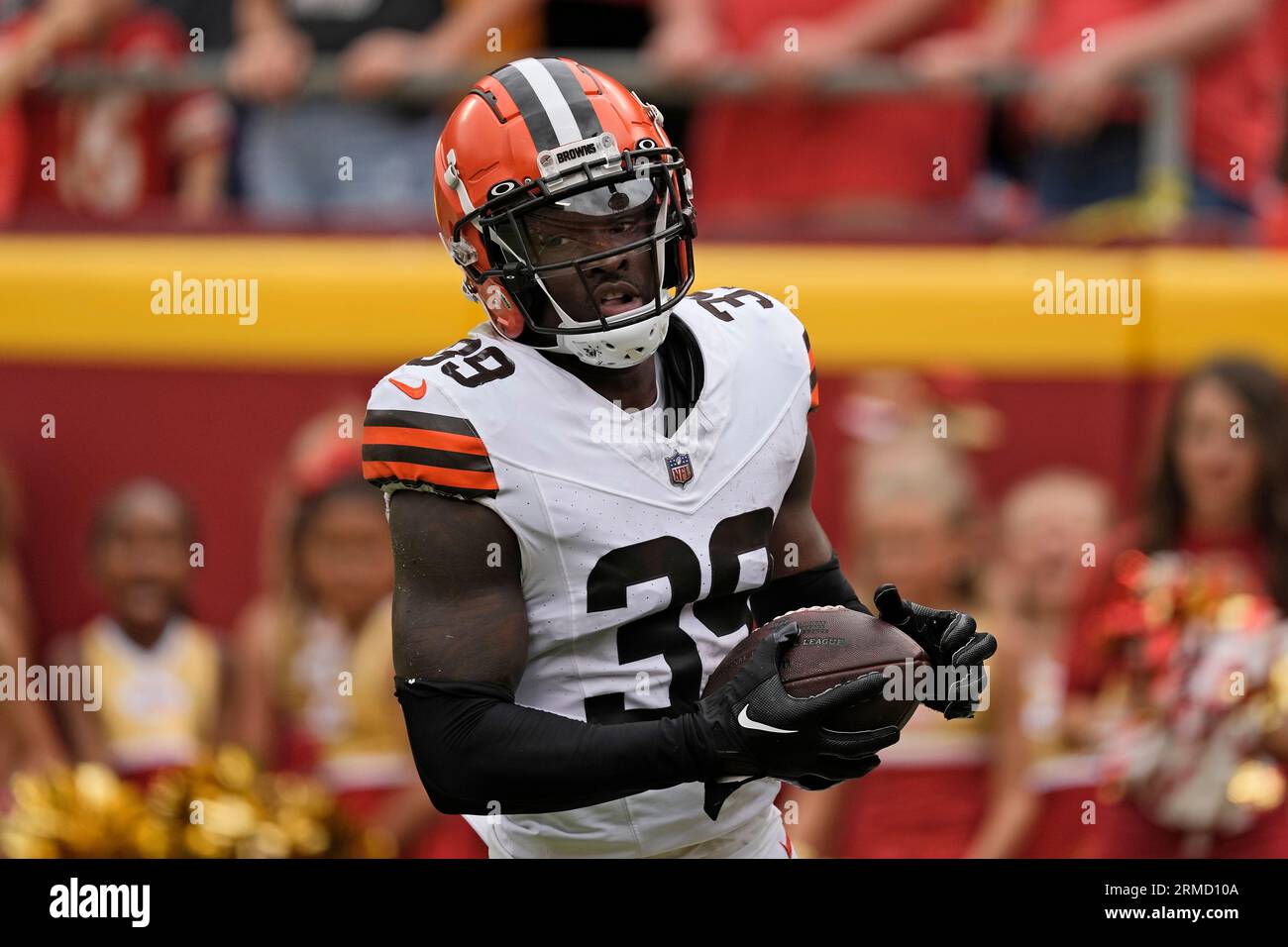 Cleveland Browns cornerback Caleb Biggers runs the ball during an