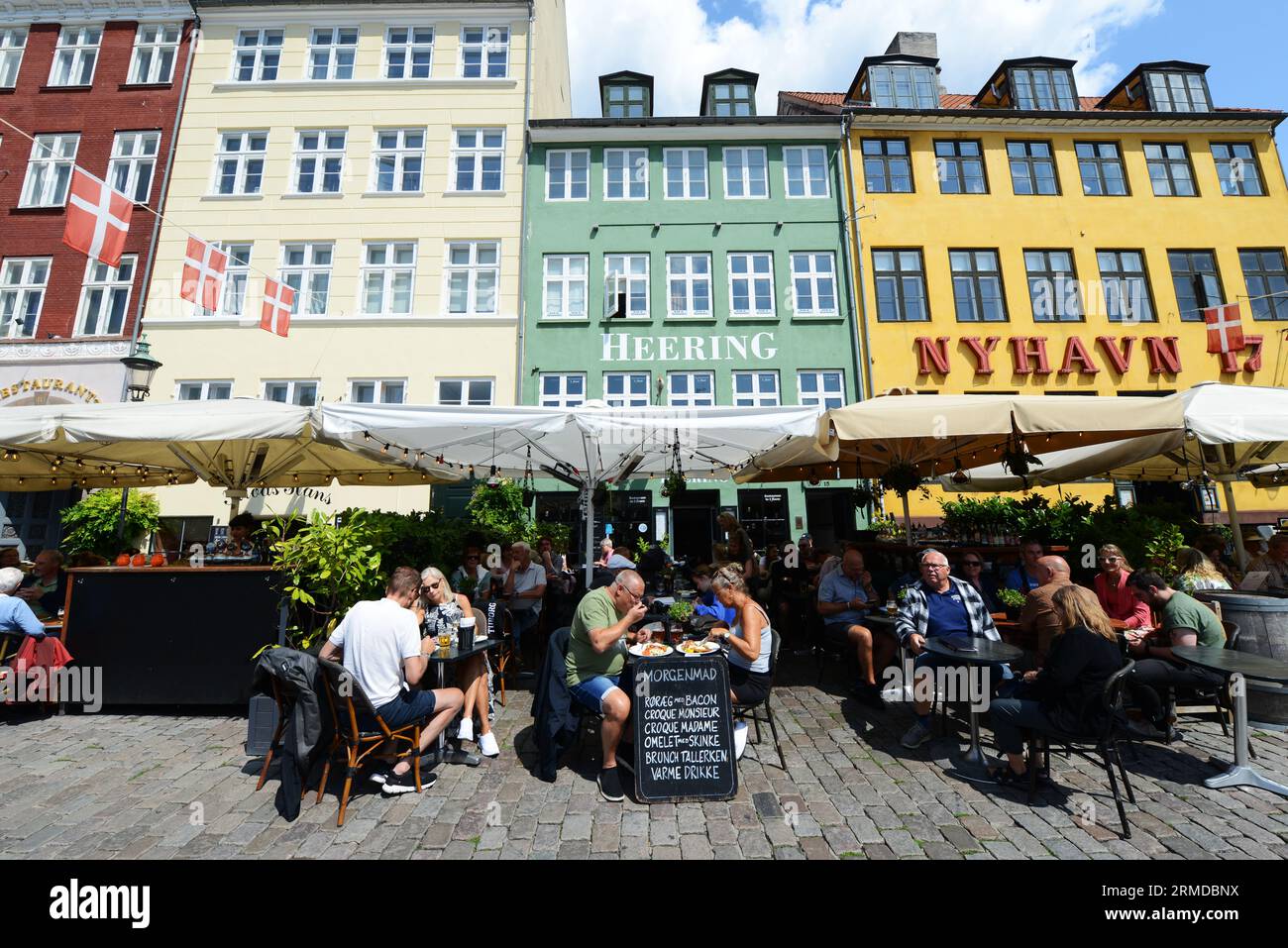 Bars and restaurants lining the northern, sunny side of Nyhavn