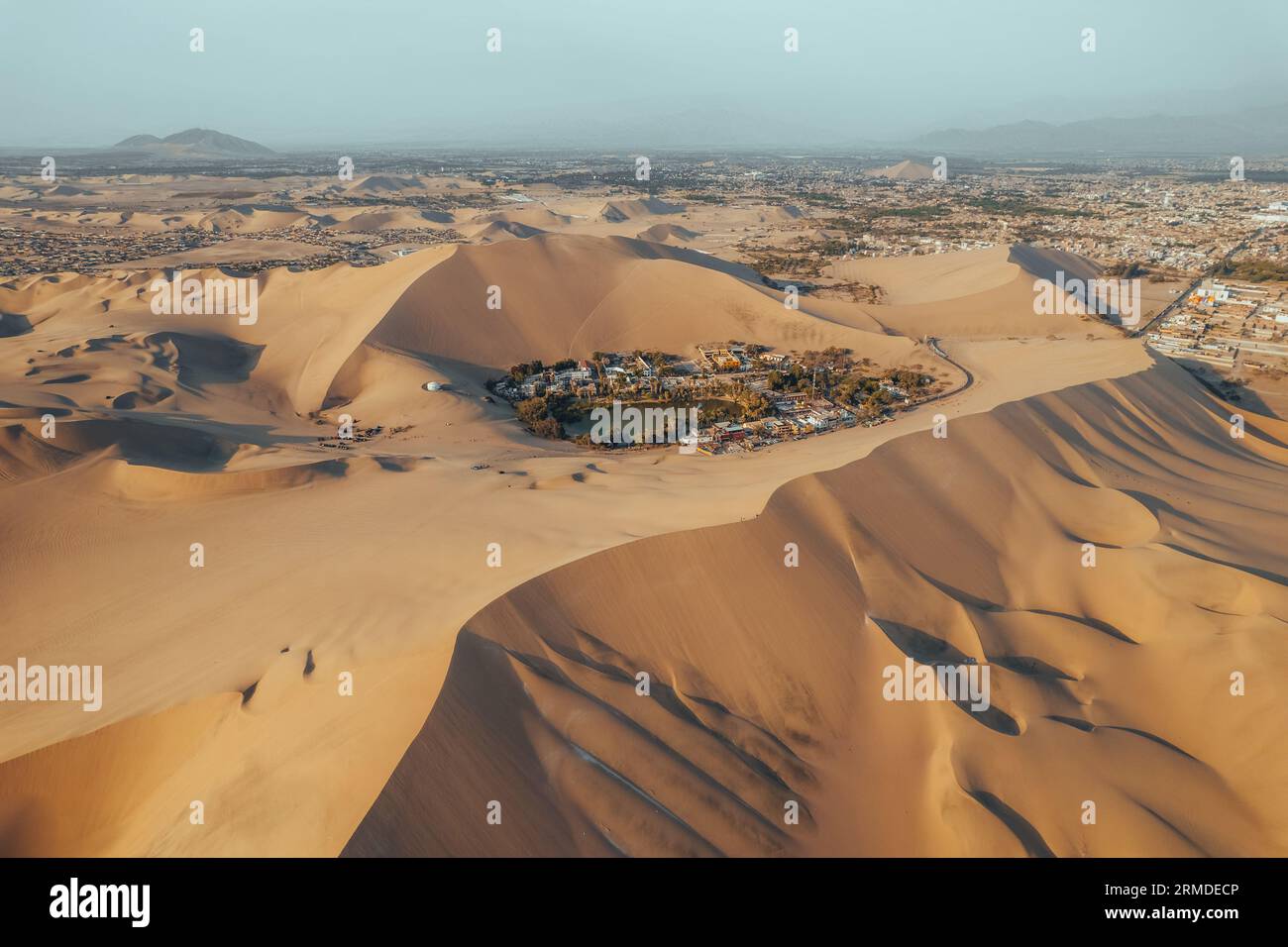Aerial Sunset Photo Of Desert Oasis Huacachina Ica Peru South aerial-sunset-photo-of-desert-oasis-huacachina-ica-peru-south
