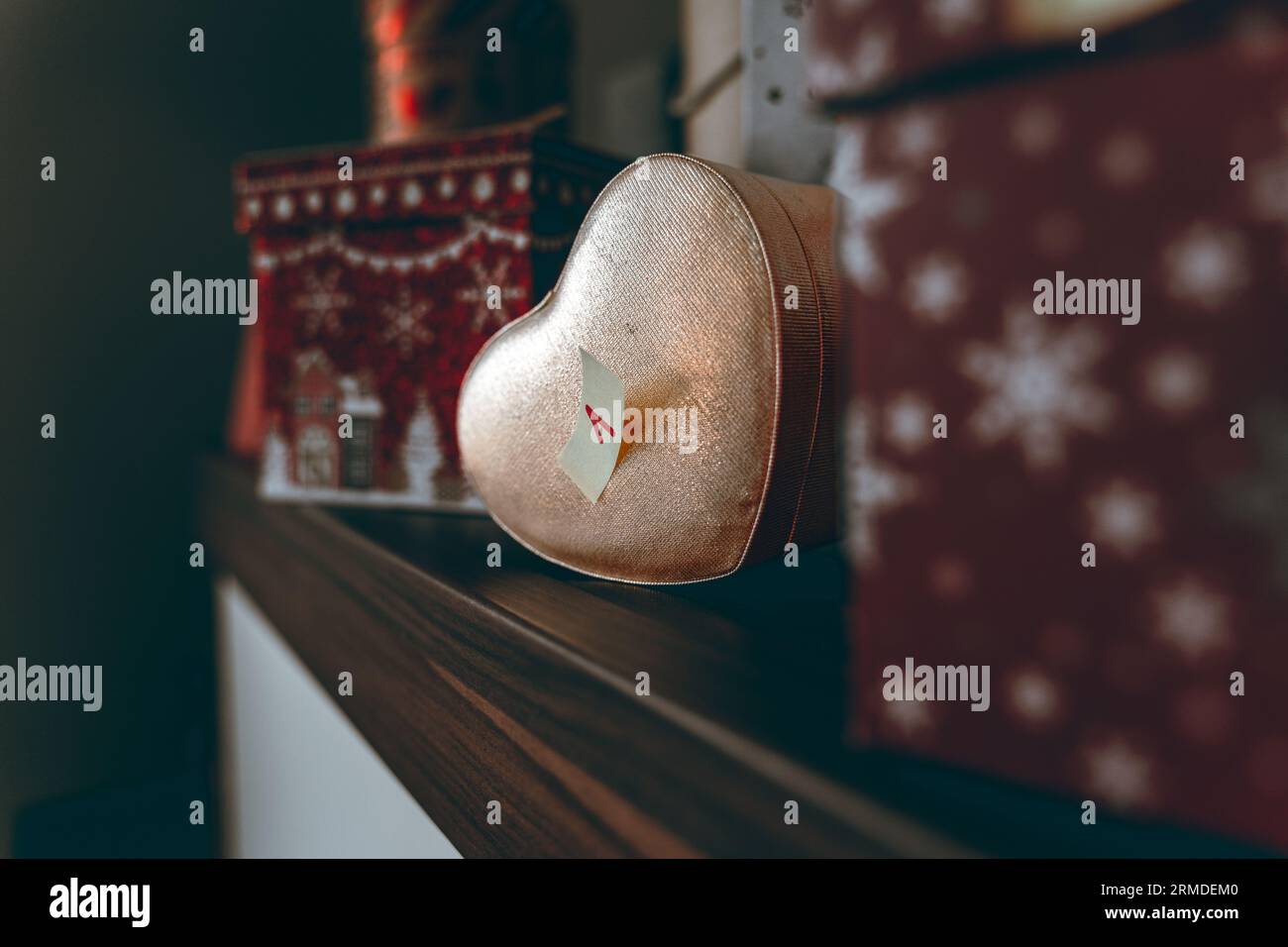 Festive advent calendar with numbered boxes and Christmas decorations. Stock Photo