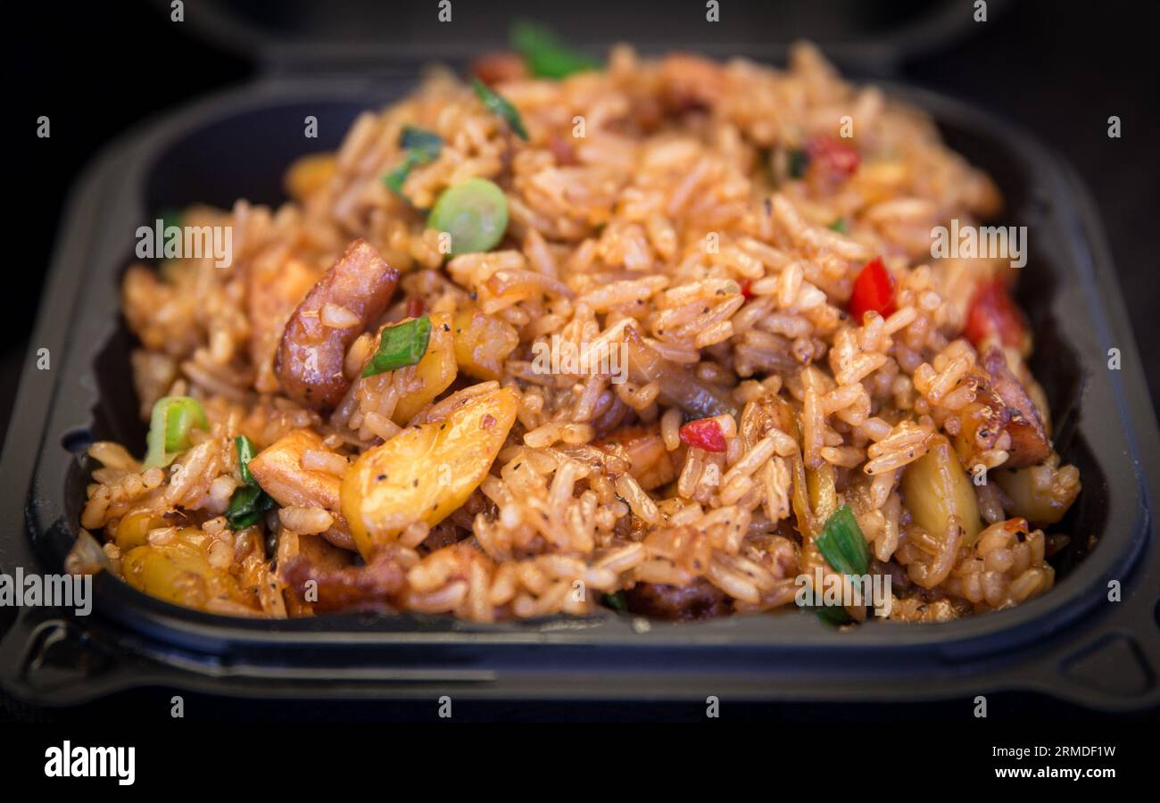 Pork and Pineapple fried rice in container for lunch Stock Photo - Alamy