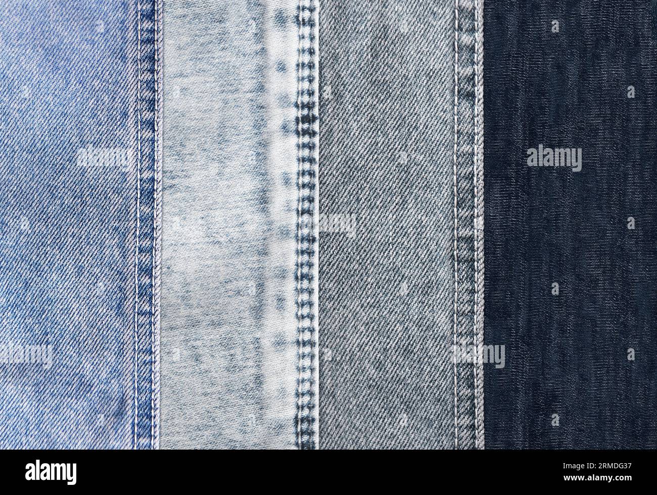 Horizontal or vertical background with denim patches of light grey, blue and black colors cotton texture. Decorative striped backdrop with blue, indig Stock Photo