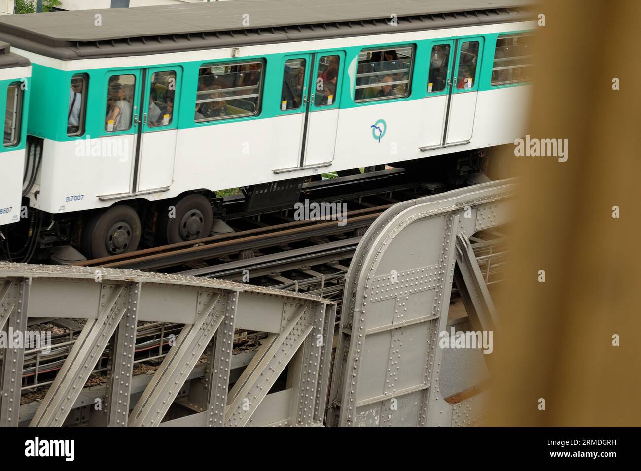 Metro Car with rubber wheels on the elevated Metro iron viaduct of Pont