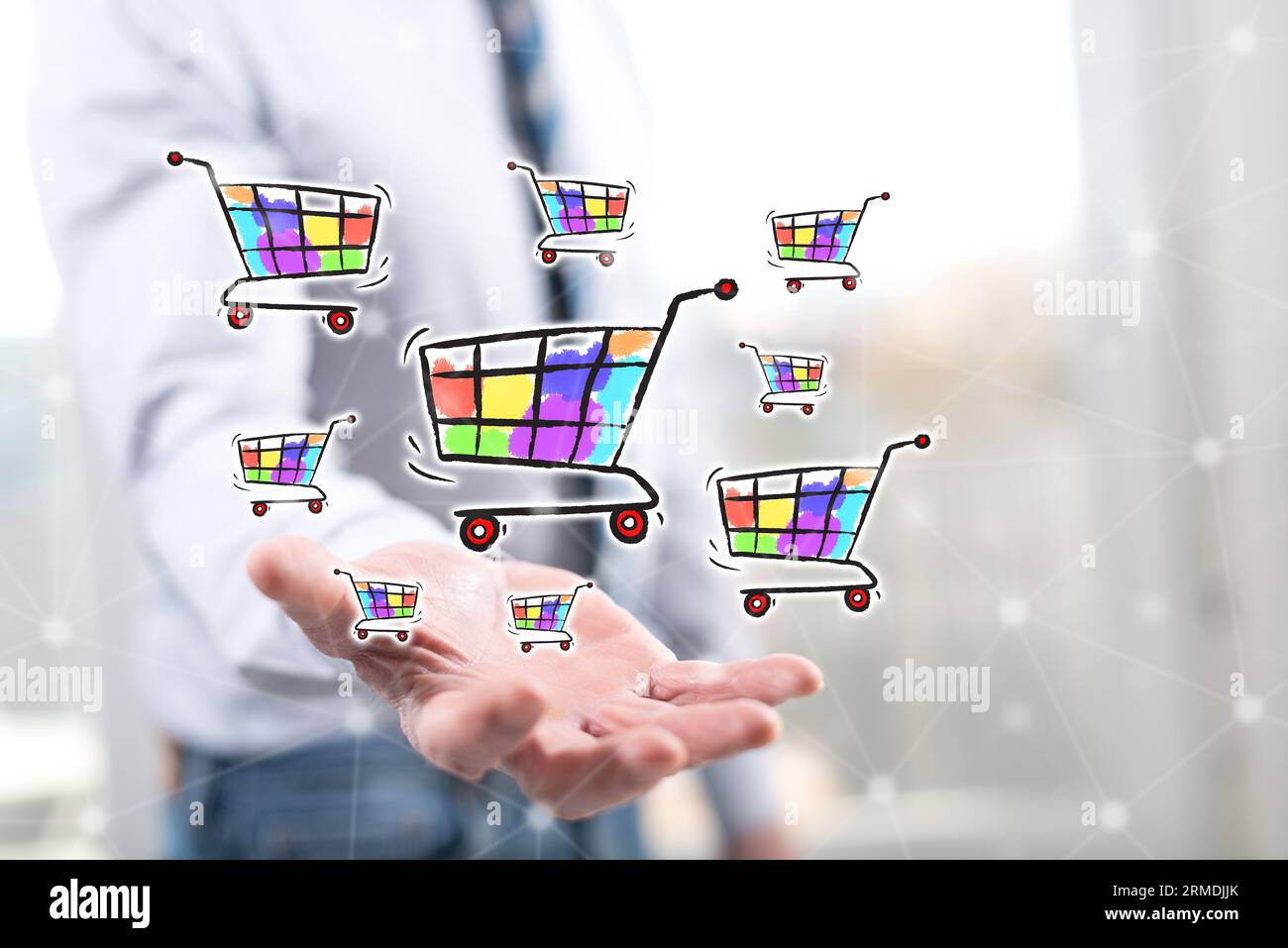 Shopping concept above the hand of a man in background Stock Photo