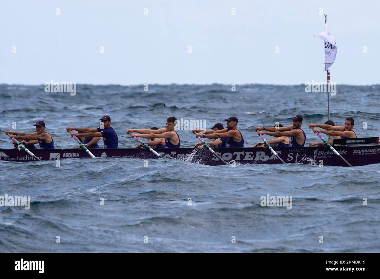 Crew of Santurtzi rowing boat in action during XIV. Getariako Ikurrina