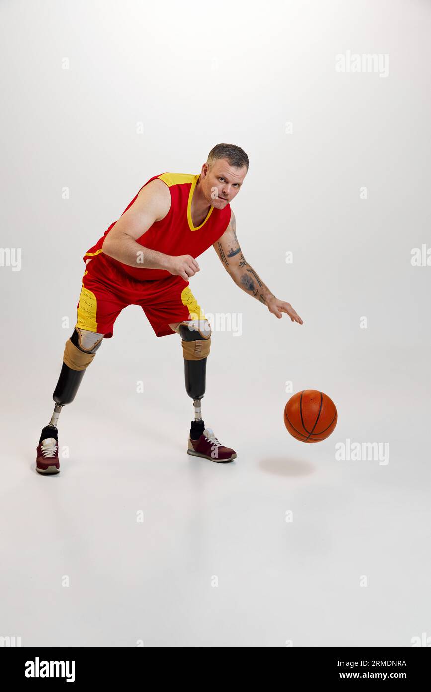 Attractive, confident, sporty man with prosthetic legs, disability with