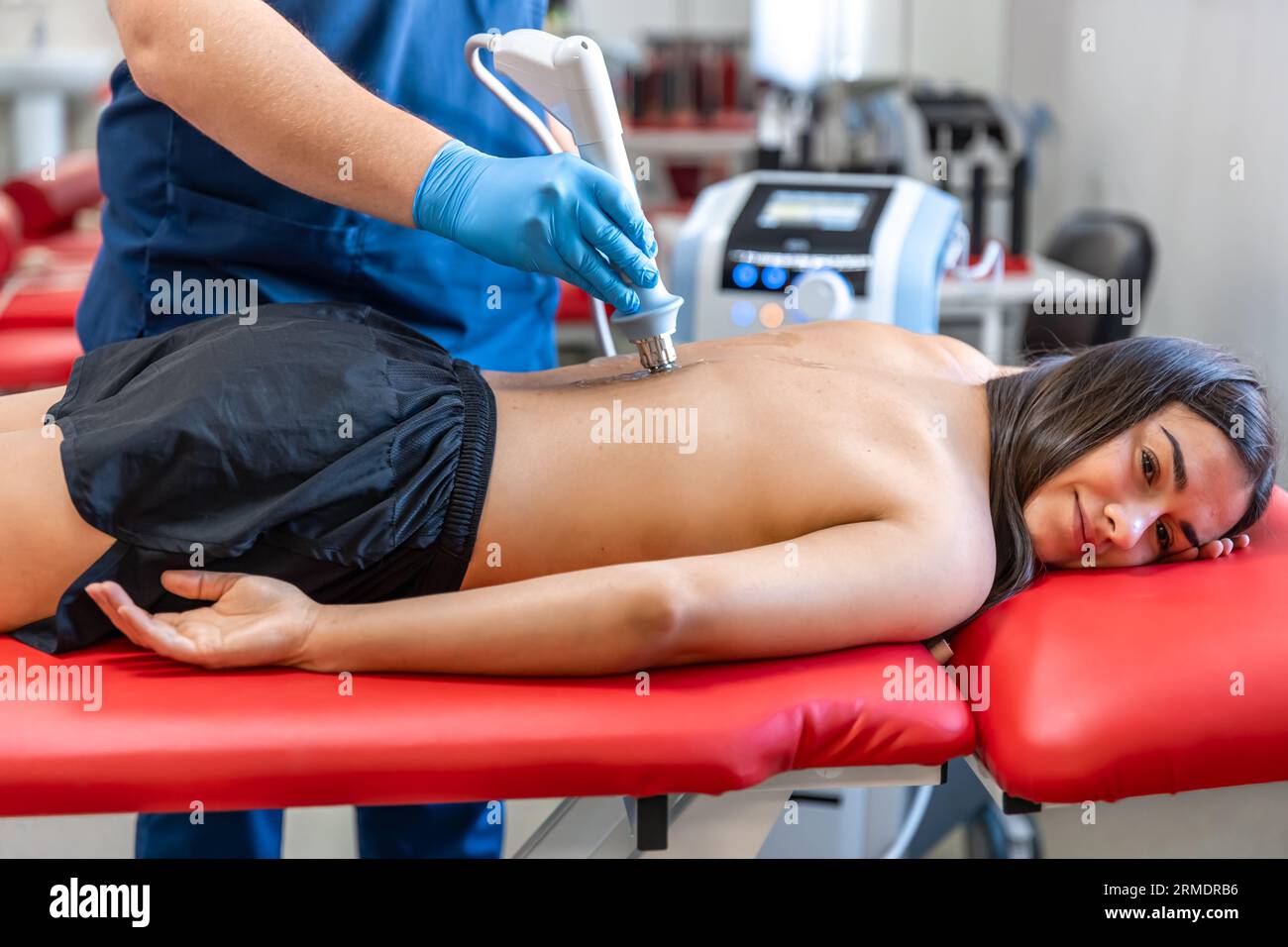 Extracorporeal Shockwave Therapy ESWT.Non-surgical treatment.Physical  therapy for neck and back muscles,spine with shock waves.Pain relief Stock  Photo - Alamy