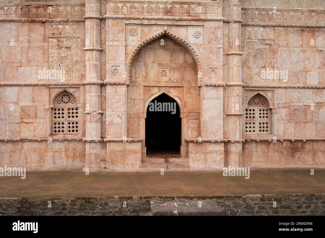 Carving details on the outer wall of Darya Khan's Tomb, located in Mandu, Madhya Pradesh, India Stock Photo