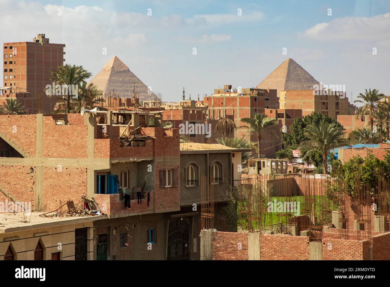 Pyramids behind the city of Giza Stock Photo