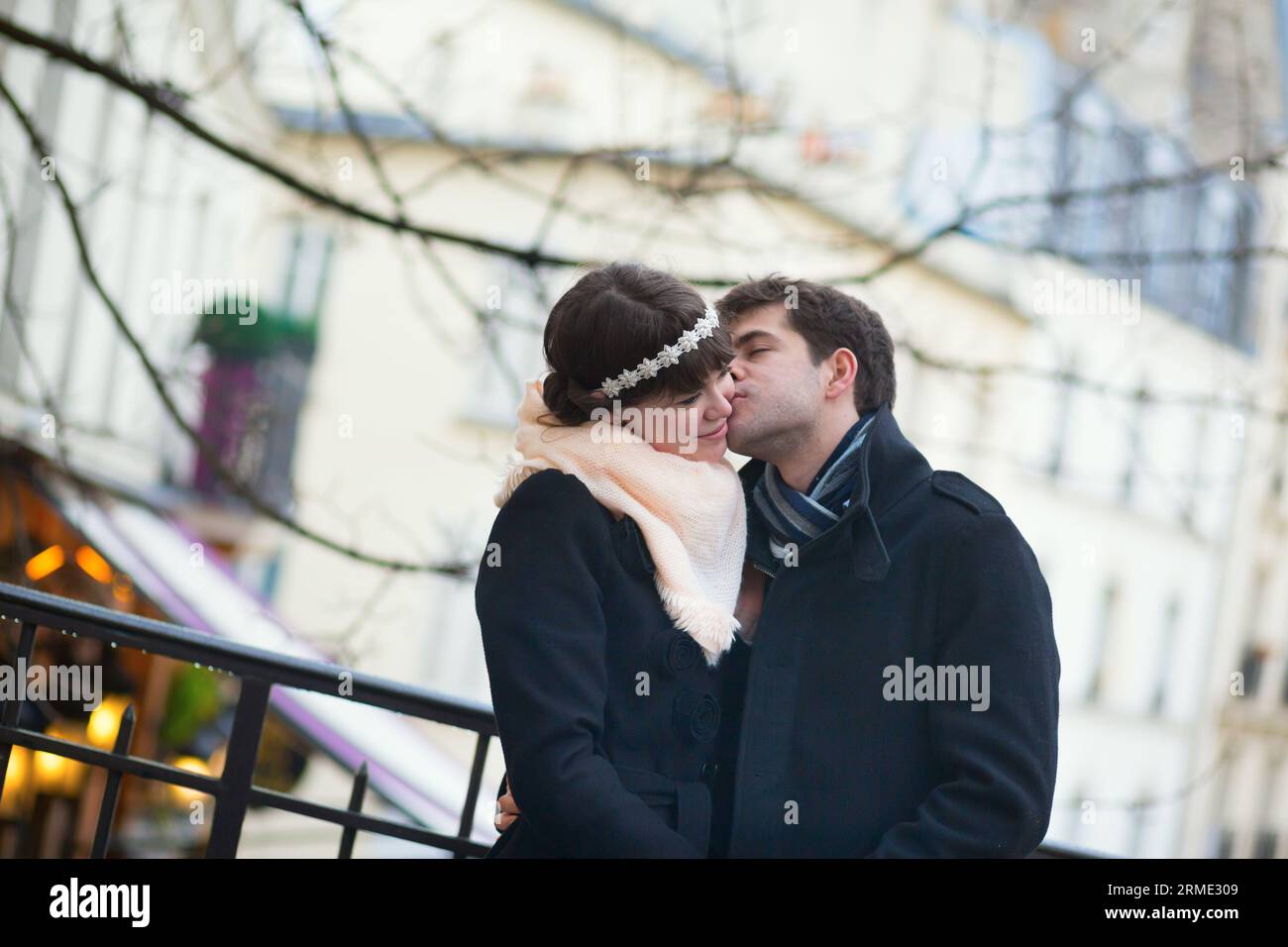 Couple kissing on european city hi-res stock photography and images - Alamy