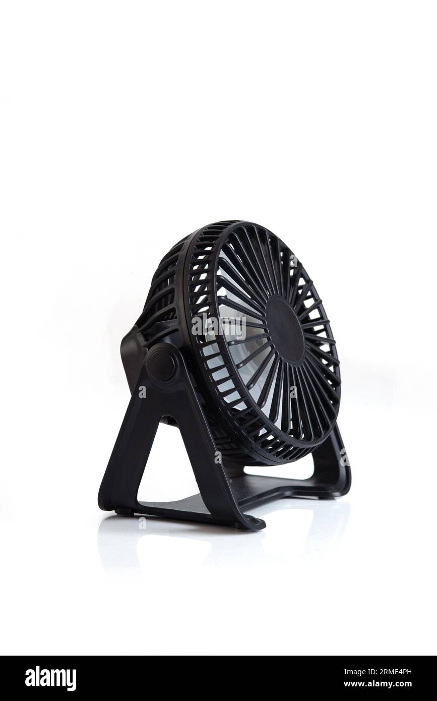 Electric mini Portable fan Cooler isolated on white background. Stock Photo