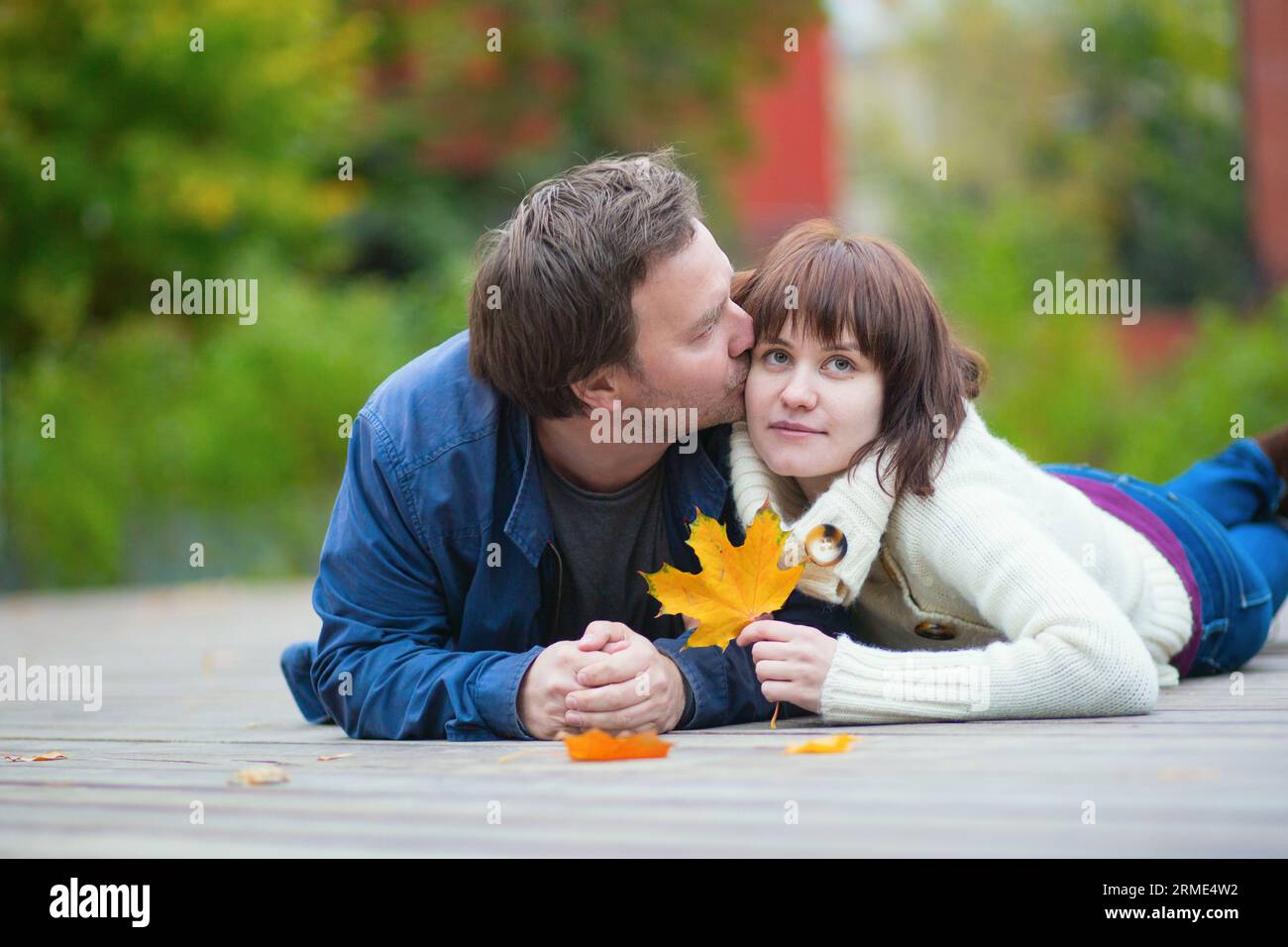Positive family girl enjoying fall hi-res stock photography and images ...
