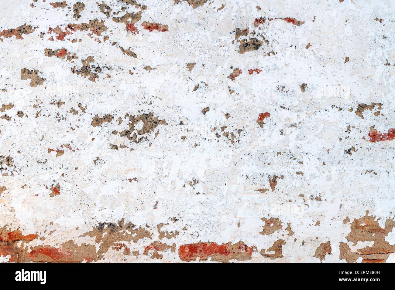 Dirty old white plastered wall with broken part as background Stock ...