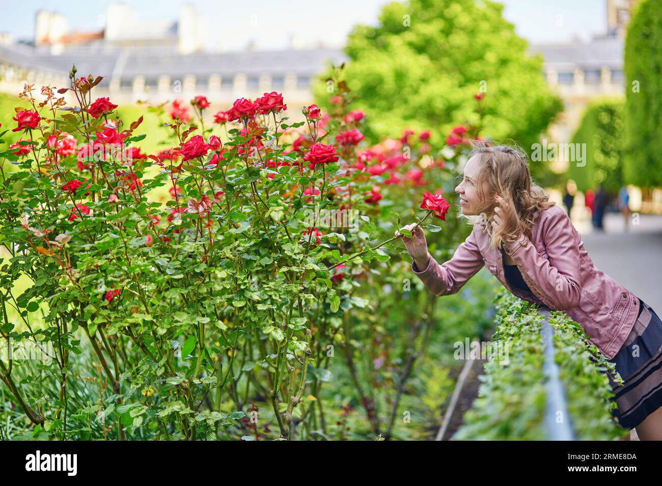 Beautiful Parisian woman in a Parisian park Stock Photo