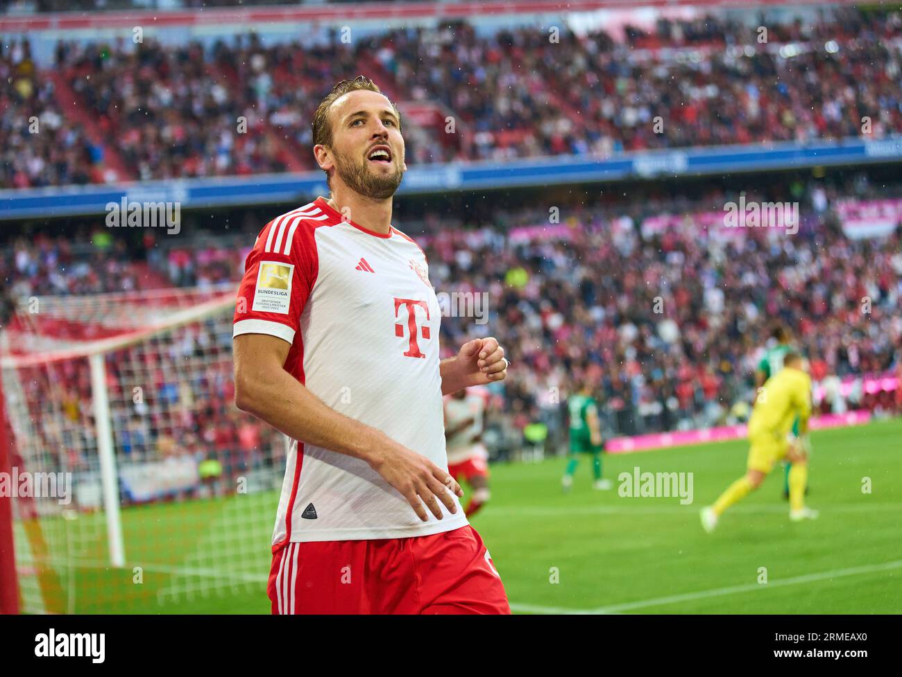 Harry Kane, FCB 9   scores, shoots 2-0 goal 11m celebrates his goal, happy, laugh, celebration,   in the match  FC BAYERN MUENCHEN - FC AUGSBURG 3-1  on Aug 27, 2023 in Munich, Germany. Season 2023/2024, 1.Bundesliga, FCB, München, matchday 3, 3.Spieltag © Peter Schatz / Alamy Live News    - DFL REGULATIONS PROHIBIT ANY USE OF PHOTOGRAPHS as IMAGE SEQUENCES and/or QUASI-VIDEO - Stock Photo