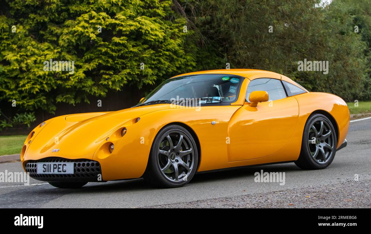 Whittlebury,Northants,UK -Aug 26th 2023: 2001 yellow TVR Tuscan car travelling on an English country road Stock Photo