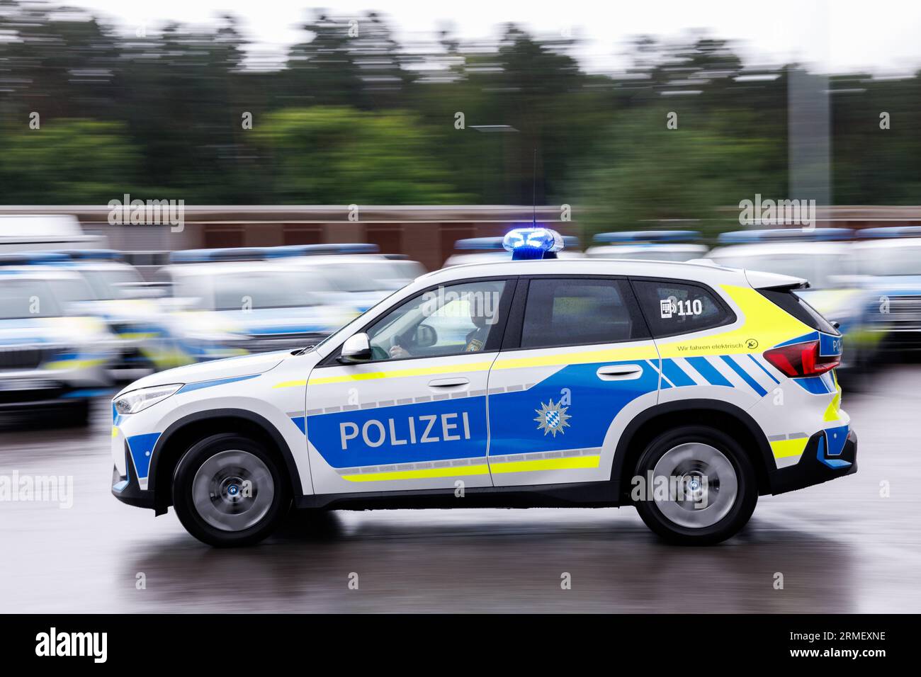 Nuremberg, Germany. 28th Aug, 2023. A police electric vehicle drives on ...