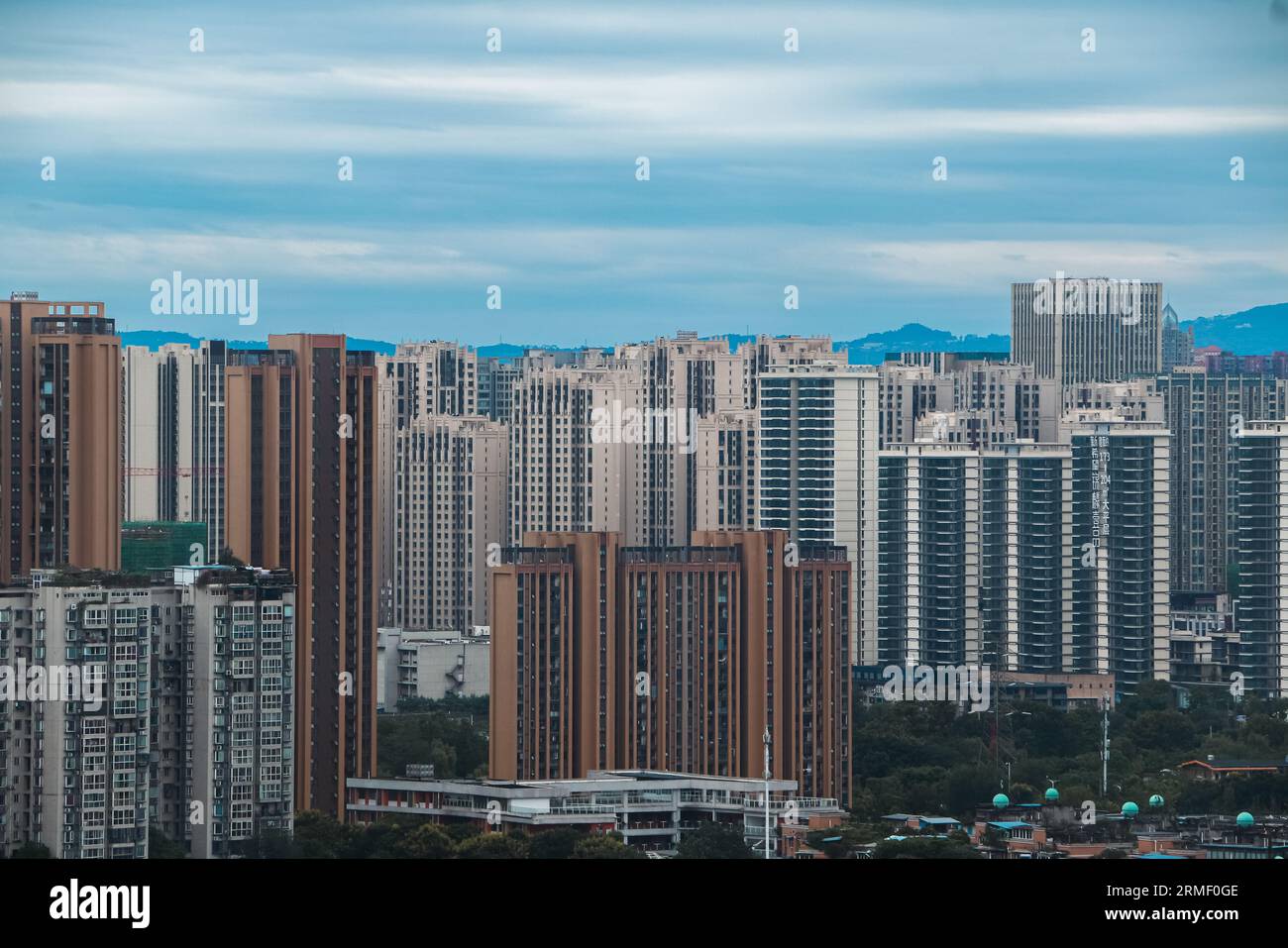 Chengdu, China 28th August 2023 clouds over blocks of new and old