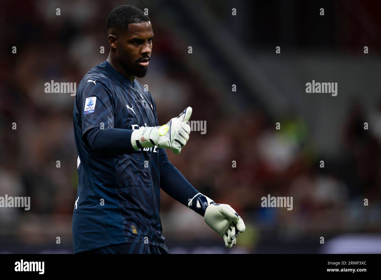 Mike Maignan of AC Milan gestures during the Serie A football match ...