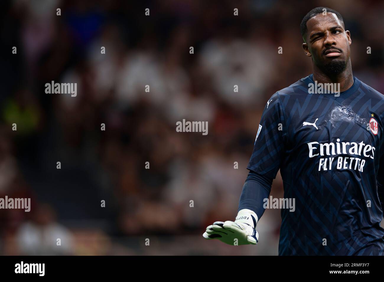 Mike Maignan of AC Milan gestures during the Serie A football match ...