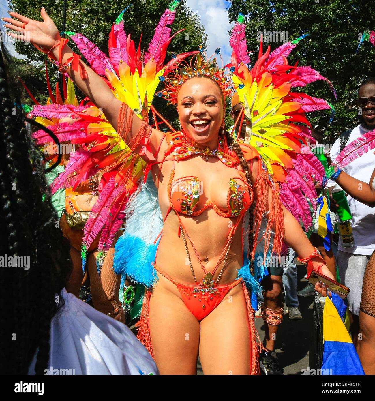 London, UK. 28th Aug, 2023. A dancer with the Aquarian Dream mas band. Participants in the main carnival parade have fun on Carnival Monday. Up to two million people are expected to celebrate the carnival this Bank Holiday Weekend participating or watching along the carnival route, at sounds systems, stalls and venues. Credit: Imageplotter/Alamy Live News Stock Photo