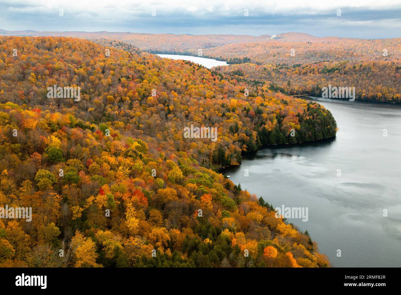 Nichols Pond seen from ledge in autumn, Woodbury, Vermont, USA Stock Photo