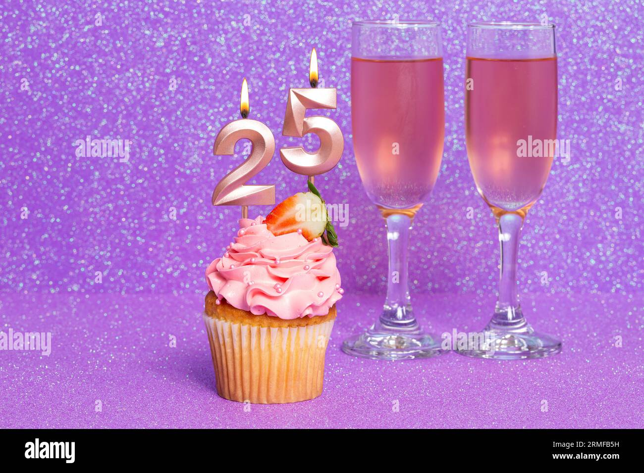 https://c8.alamy.com/comp/2RMFB5H/cupcake-with-number-and-glasses-with-wine-for-birthday-or-anniversary-celebration-number-twenty-five-2RMFB5H.jpg