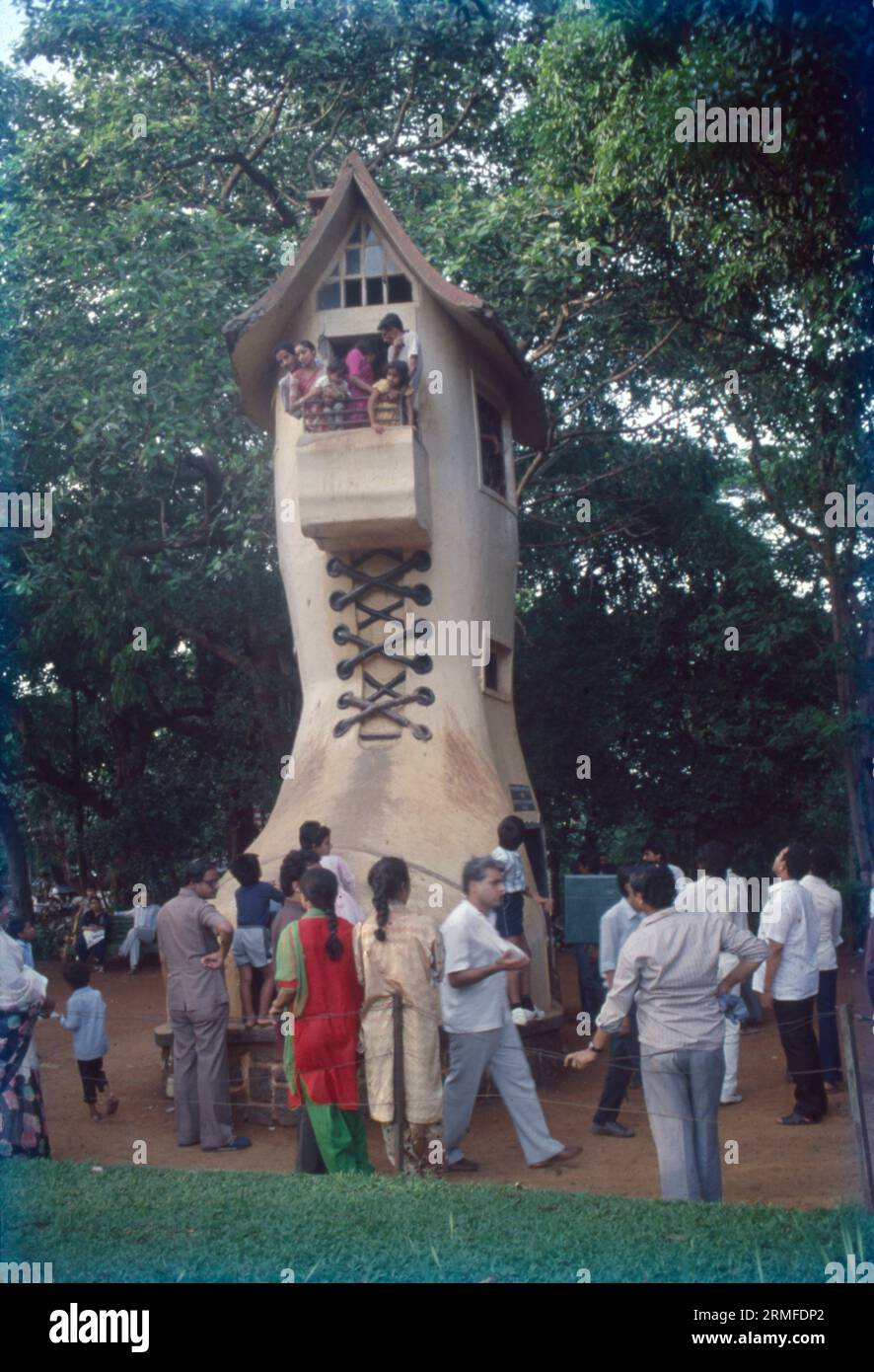 Kamla Nehru Park “Built in 1952, Kamla Nehru Park (Also called 'Old Women Shoe, Boot House, and Juta Ghar') was a gift to the kids of Mumbai from Chacha Nehru. The name 'Kamla' was his wife's name, which is why the park is called. Big Shoe House. Mumbai, India Stock Photo